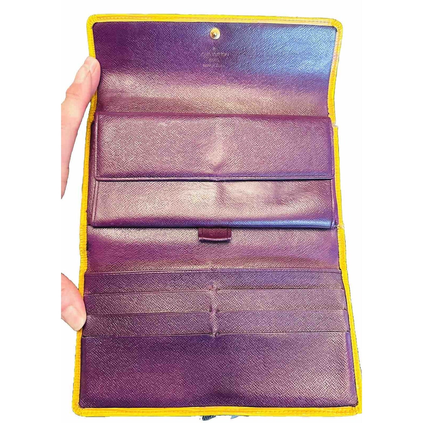 Authentic LOUIS VUITTON Epi Porte Tresor International Snap Wallet in Yellow