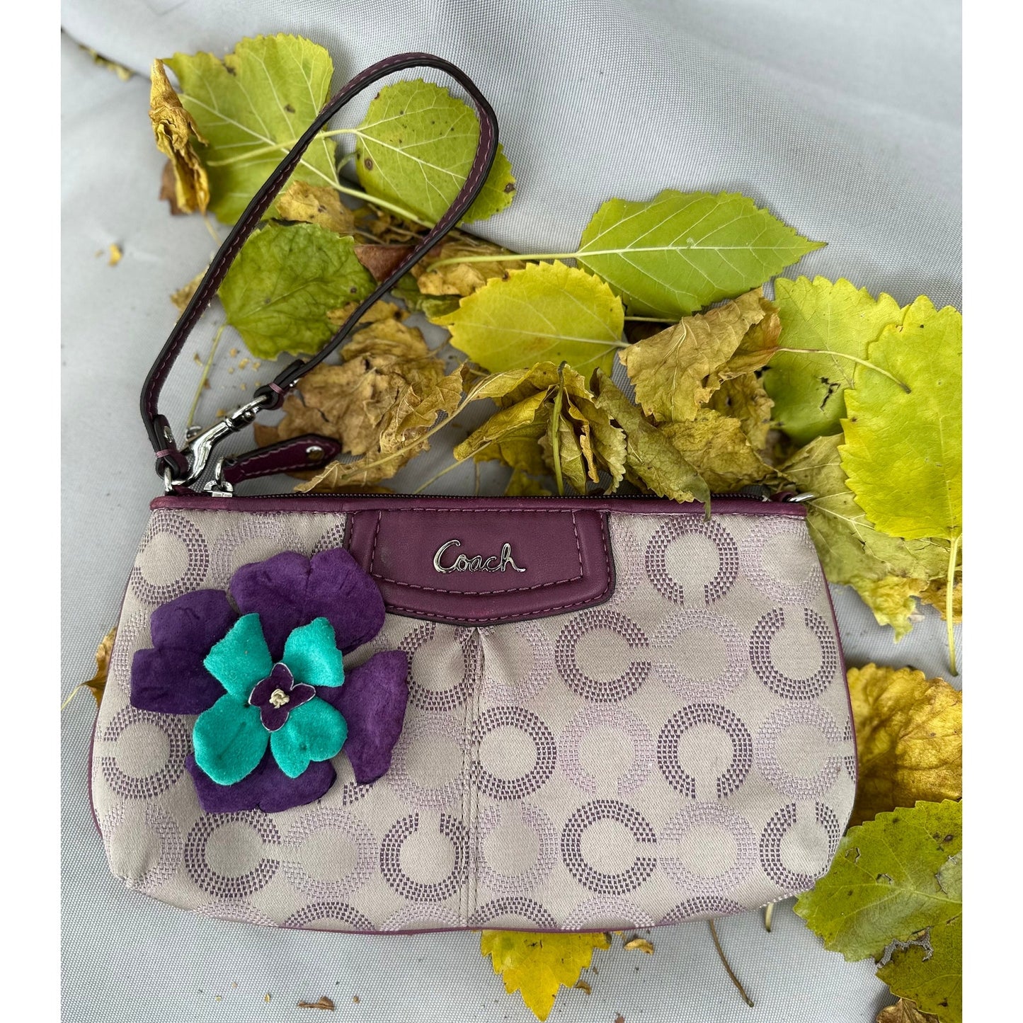 Coach Wristlet with suede flowers. Upstyled . 9.25 × 5.5