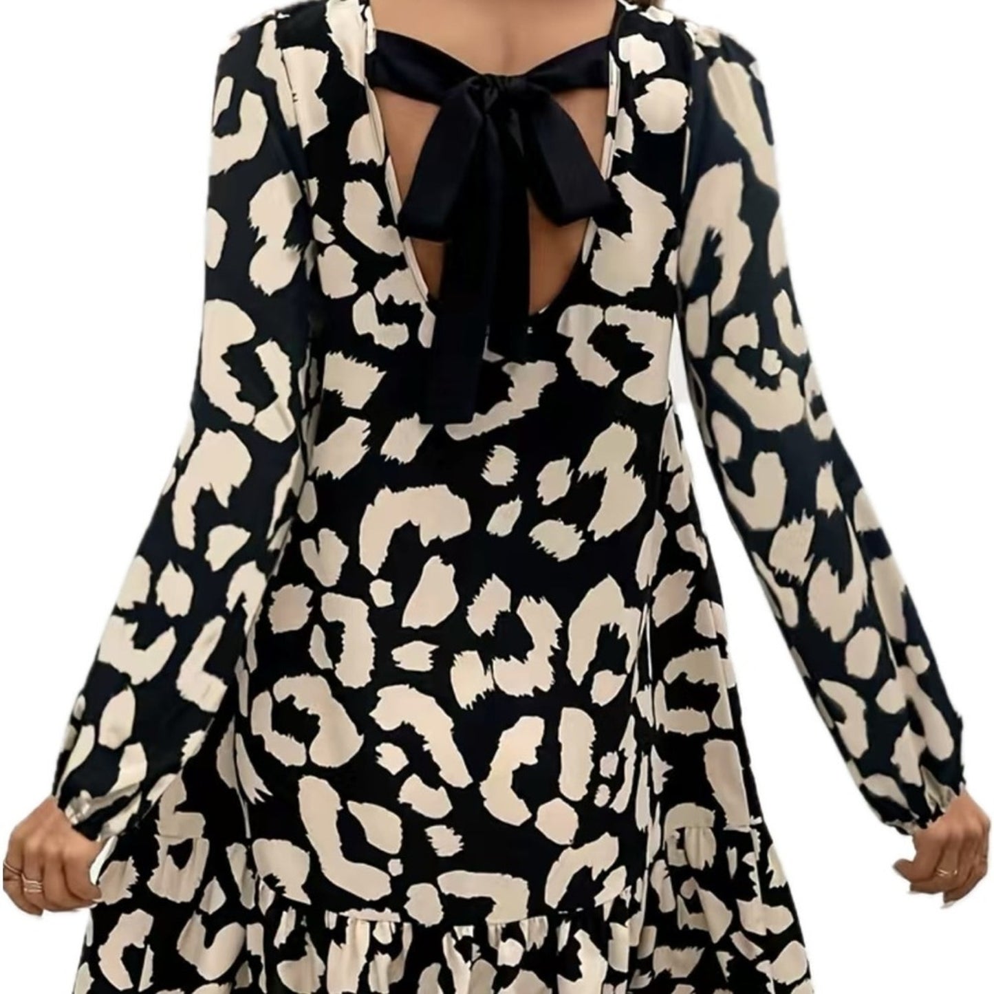 Black cream print dress with ruffle bottom and black ribbon tying the back 8/10