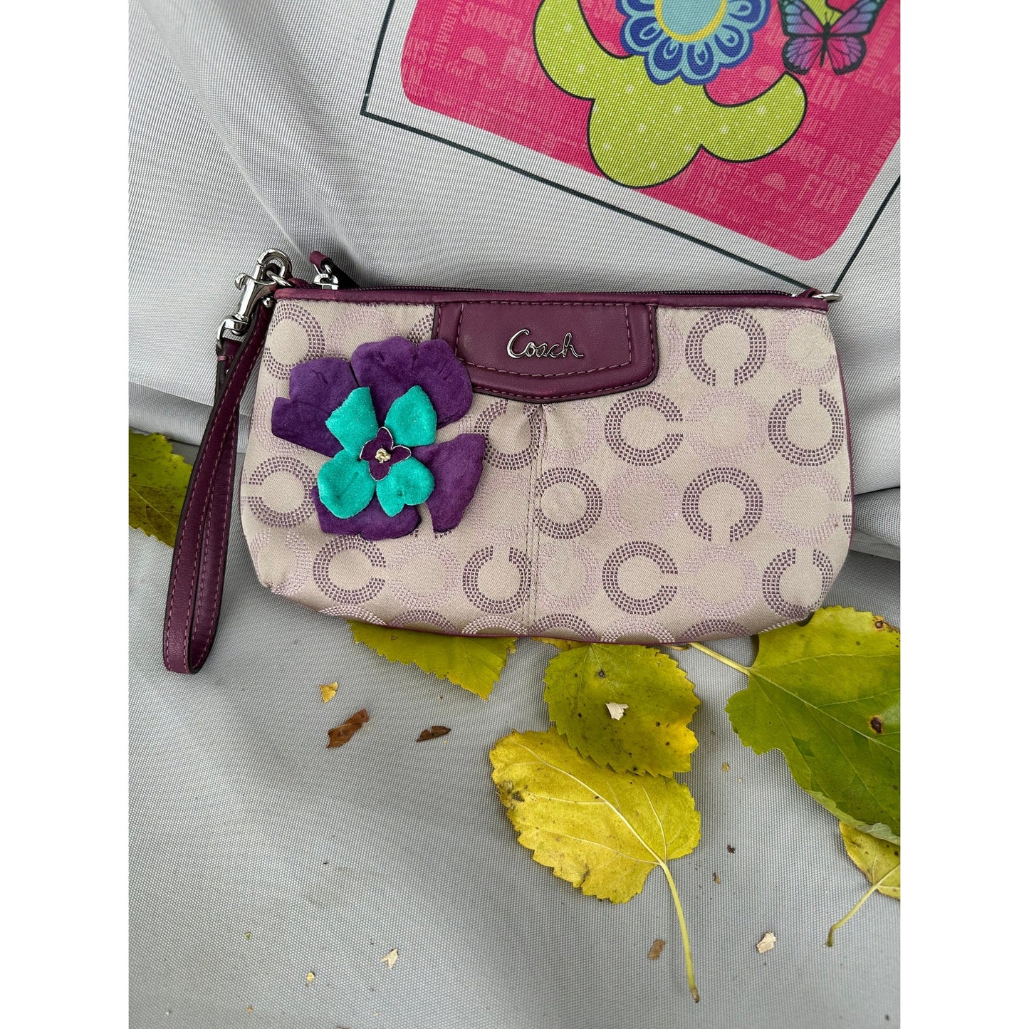 Coach Wristlet with suede flowers. Upstyled . 9.25 × 5.5