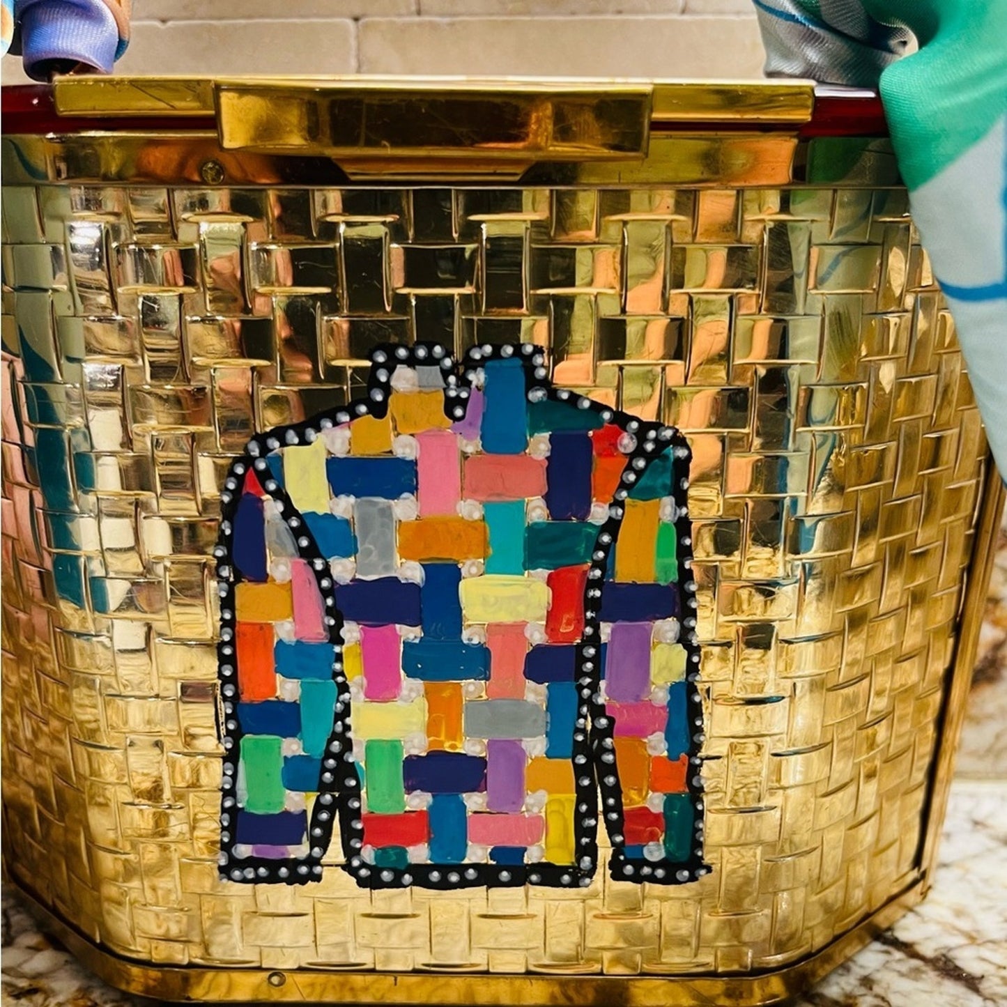 lucite purse in gold basketweave with lucite handles and top lid.