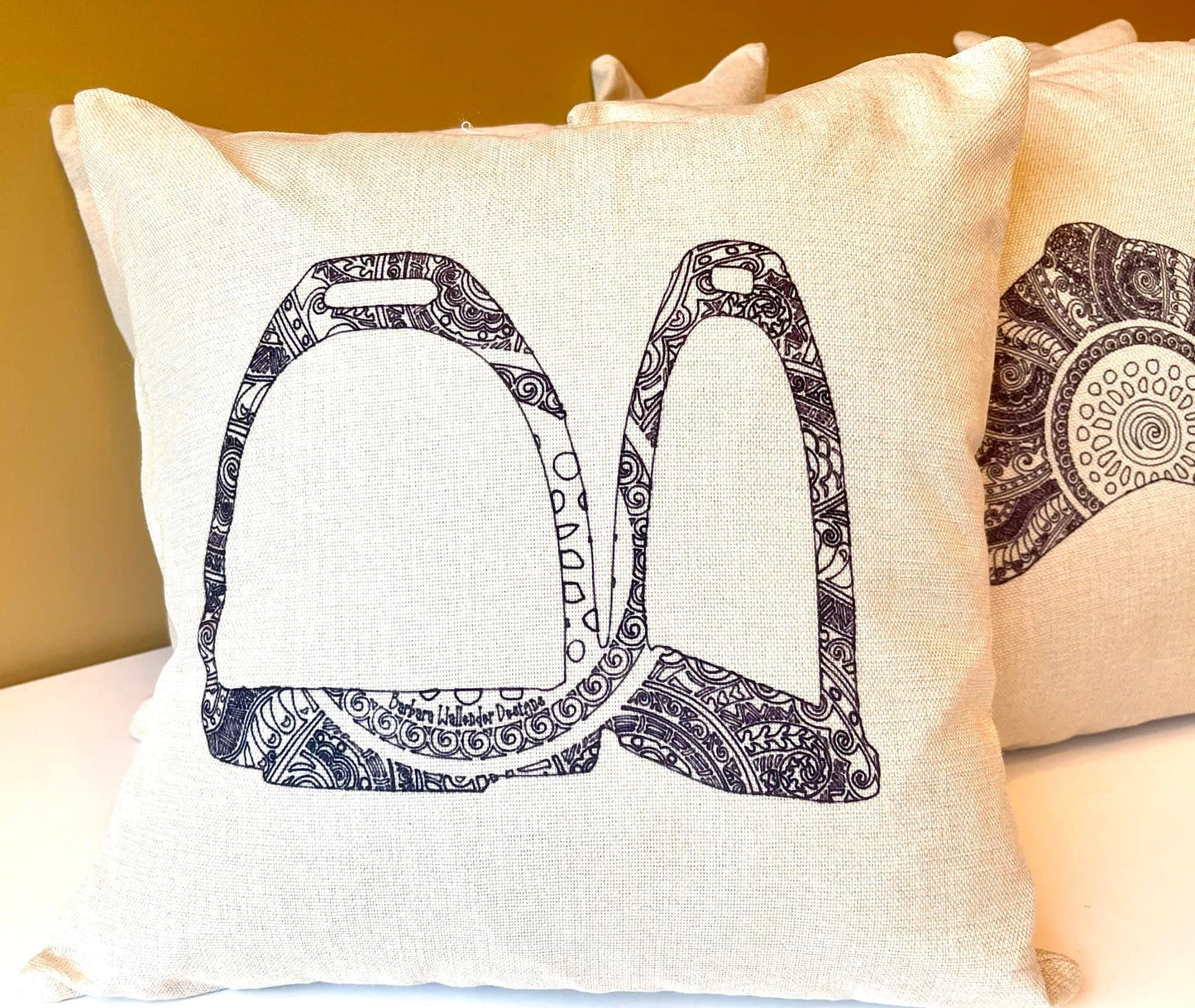 The More Leg Collection Throw Pillow features saddle, bit,irons, helmet, boots on beige linen look pillow. 16 x 16 cover only