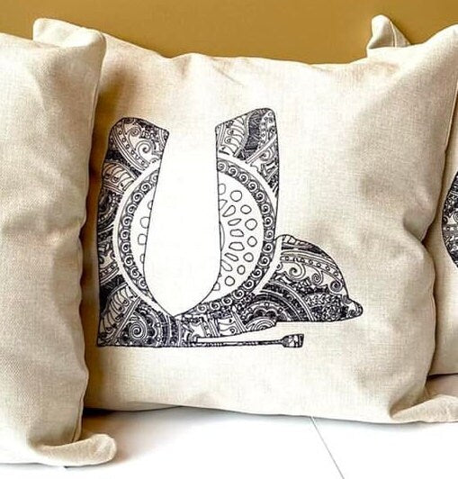 The More Leg Collection Throw Pillow features saddle, bit,irons, helmet, boots on beige linen look pillow. 16 x 16 cover only