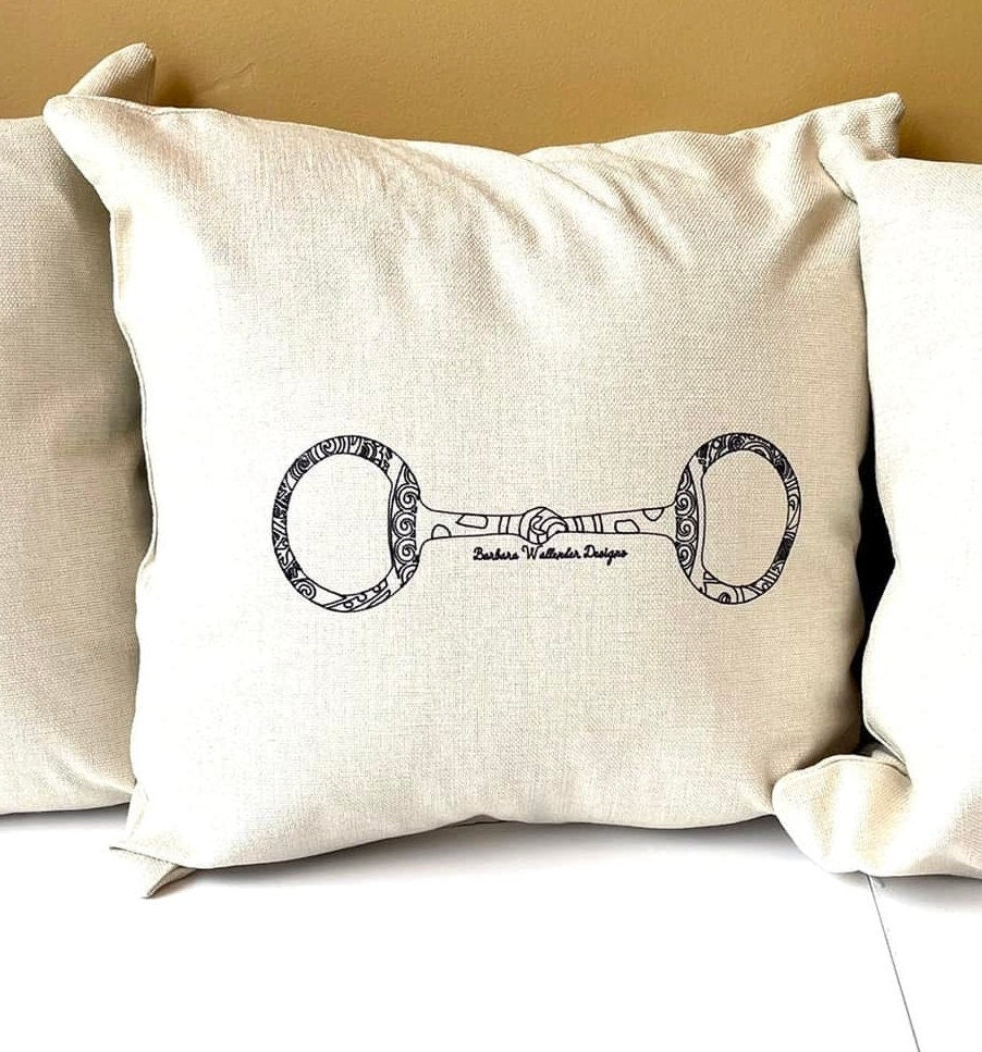 The More Leg Collection Throw Pillow features saddle, bit,irons, helmet, boots on beige linen look pillow. 16 x 16 cover only