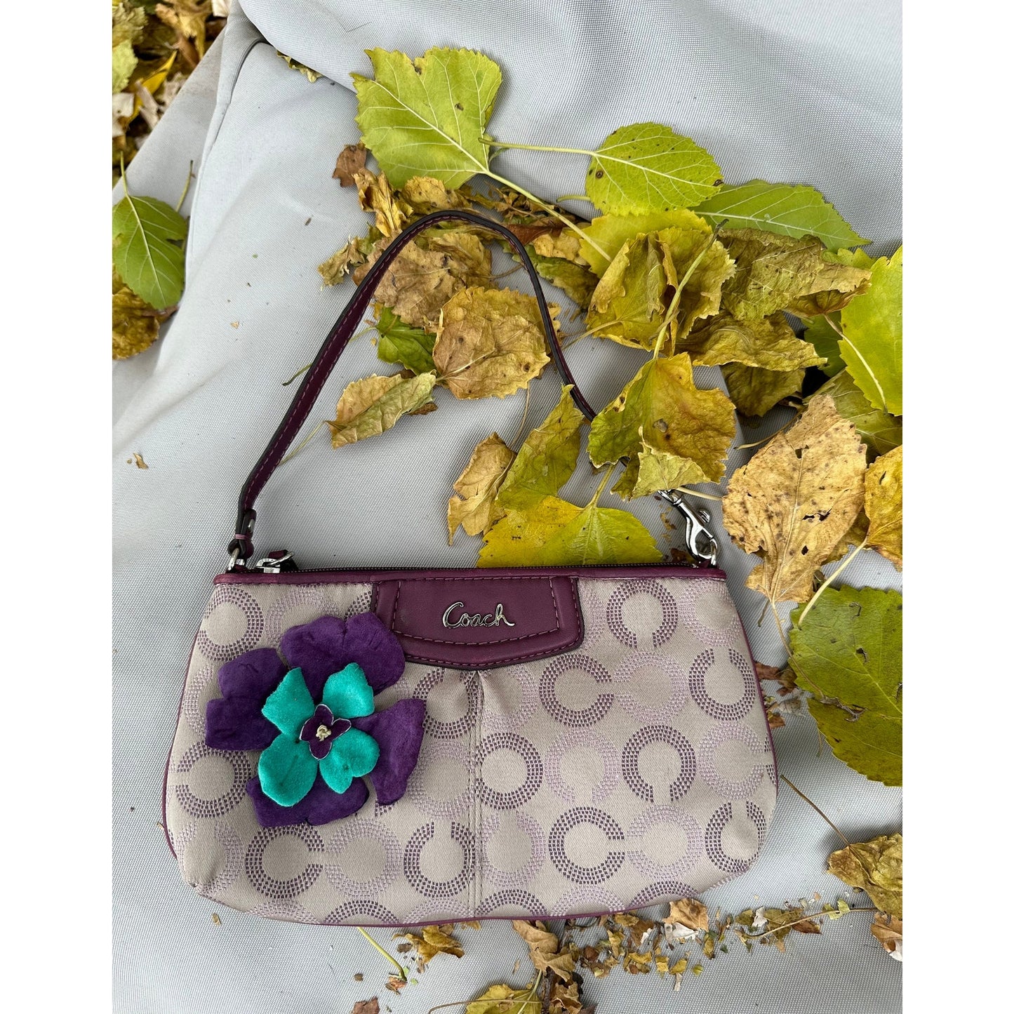 Coach Wristlet with suede flowers. Upstyled . 9.25 × 5.5