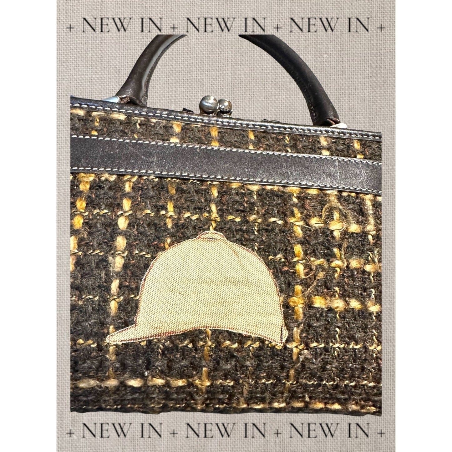 Jones New York leather lambswool and man made elements and a helmet embellished on a canvas appliqué.