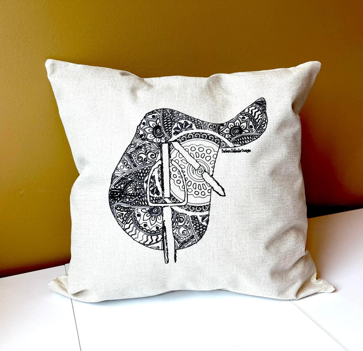 The Chin Up Collection Throw Pillows featuring a saddle, bit, irons, boots & helmet motif on cover only linen blend.