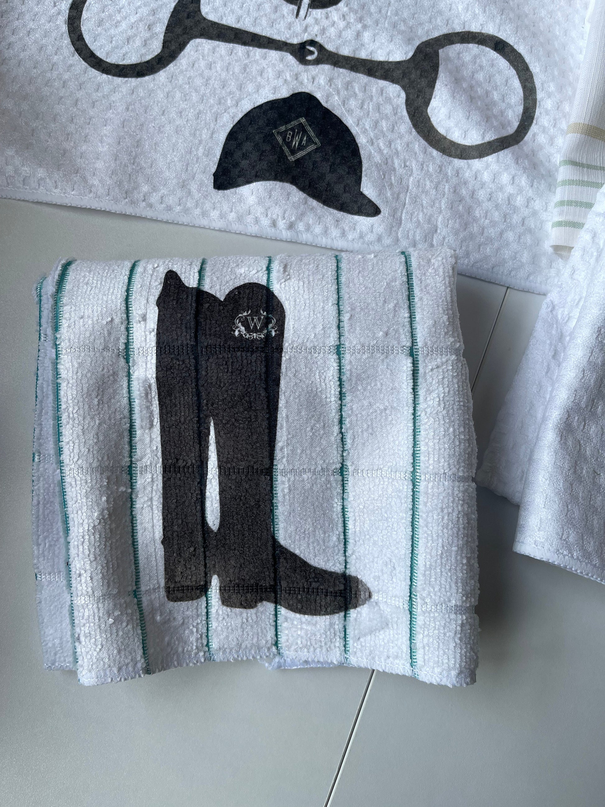 Hand crafted tea towels for the English Equestrian, featuring bit, helmet, saddle, boots, etc.